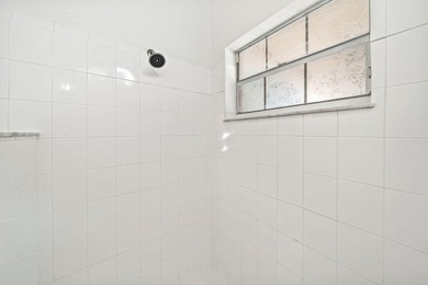 Beautifully remodeled single-story home offering 2 bedrooms, 2 on PGA National Golf Club in Florida - for sale on GolfHomes.com, golf home, golf lot