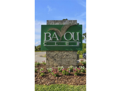 This is your Bayou Club dream come true! Safe and secure, gated on Bayou Golf Club in Florida - for sale on GolfHomes.com, golf home, golf lot
