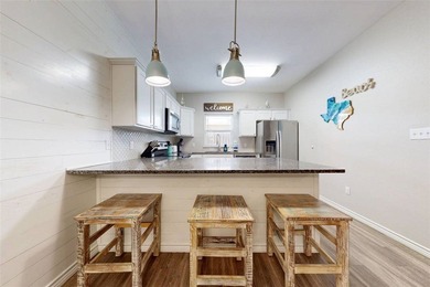 Beach life just got easier at popular Beachside Townhomes-2 on Palmilla Beach Golf Club in Texas - for sale on GolfHomes.com, golf home, golf lot