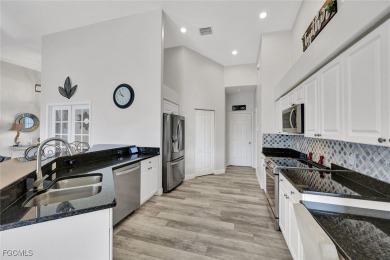 Welcome to your beautifully refreshed oasis in Fountain on Pelican Sound Golf and River Club in Florida - for sale on GolfHomes.com, golf home, golf lot