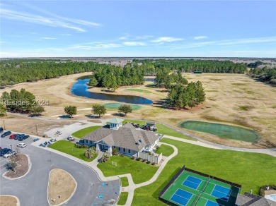 Presenting a prime wide lakefront lot nestled on a cul-de-sac on Hilton Head Lakes Golf Club in South Carolina - for sale on GolfHomes.com, golf home, golf lot