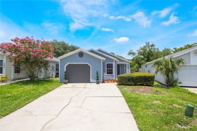 Experience breathtaking lake views from this adorable 3 bedroom on Mayfair Country Club in Florida - for sale on GolfHomes.com, golf home, golf lot