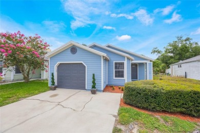 Experience breathtaking lake views from this adorable 3 bedroom on Mayfair Country Club in Florida - for sale on GolfHomes.com, golf home, golf lot