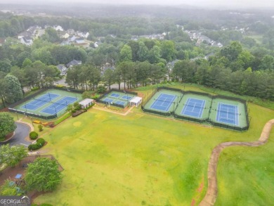 It looks like something out of a storybook- crisp trim on Reunion Golf Club in Georgia - for sale on GolfHomes.com, golf home, golf lot