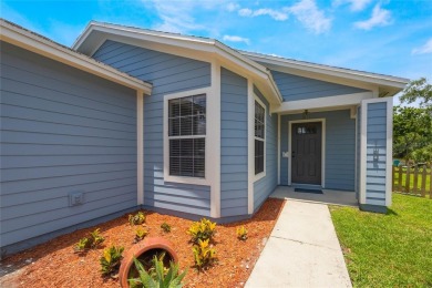 Experience breathtaking lake views from this adorable 3 bedroom on Mayfair Country Club in Florida - for sale on GolfHomes.com, golf home, golf lot