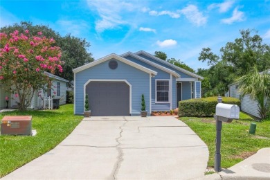 Experience breathtaking lake views from this adorable 3 bedroom on Mayfair Country Club in Florida - for sale on GolfHomes.com, golf home, golf lot