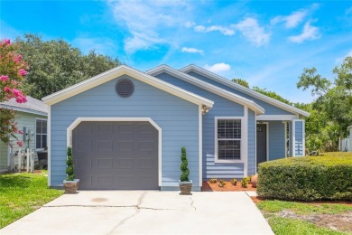 Experience breathtaking lake views from this adorable 3 bedroom on Mayfair Country Club in Florida - for sale on GolfHomes.com, golf home, golf lot