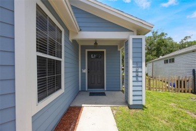 Experience breathtaking lake views from this adorable 3 bedroom on Mayfair Country Club in Florida - for sale on GolfHomes.com, golf home, golf lot