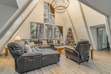 Welcome to 50 Knollwood Way, a quintessential A-frame chalet on Angel Fire Resort Country Club in New Mexico - for sale on GolfHomes.com, golf home, golf lot