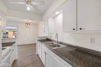 This upper-floor 2-bedroom condo offers beautiful views of the on Marysville Golf Course in Michigan - for sale on GolfHomes.com, golf home, golf lot
