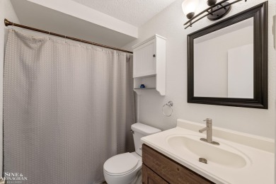 This upper-floor 2-bedroom condo offers beautiful views of the on Marysville Golf Course in Michigan - for sale on GolfHomes.com, golf home, golf lot