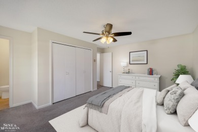 This upper-floor 2-bedroom condo offers beautiful views of the on Marysville Golf Course in Michigan - for sale on GolfHomes.com, golf home, golf lot