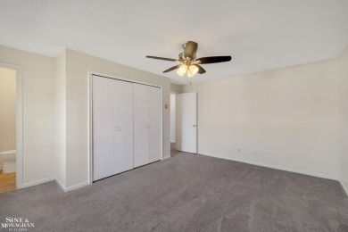 This upper-floor 2-bedroom condo offers beautiful views of the on Marysville Golf Course in Michigan - for sale on GolfHomes.com, golf home, golf lot