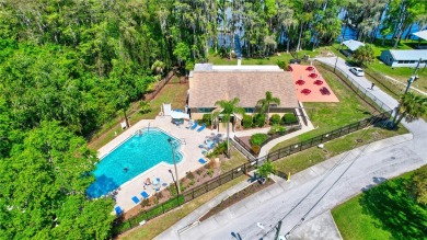 Beautiful home situated on a large and scenic lot with luscious on Highland Lakes Executive Golf Course in Florida - for sale on GolfHomes.com, golf home, golf lot