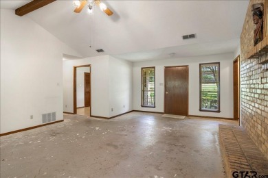 Discover the potential in this 3 bedroom, 2 bath home tucked on Hide-A-Way Lake Golf Course in Texas - for sale on GolfHomes.com, golf home, golf lot