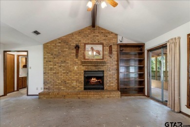 Discover the potential in this 3 bedroom, 2 bath home tucked on Hide-A-Way Lake Golf Course in Texas - for sale on GolfHomes.com, golf home, golf lot