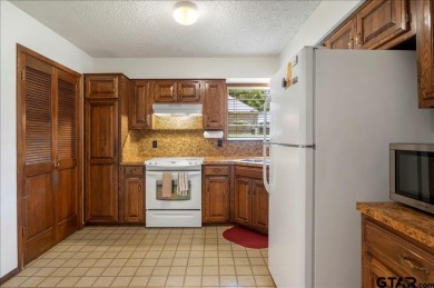 Discover the potential in this 3 bedroom, 2 bath home tucked on Hide-A-Way Lake Golf Course in Texas - for sale on GolfHomes.com, golf home, golf lot