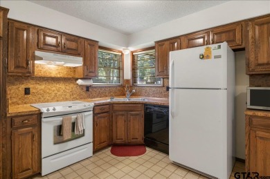 Discover the potential in this 3 bedroom, 2 bath home tucked on Hide-A-Way Lake Golf Course in Texas - for sale on GolfHomes.com, golf home, golf lot