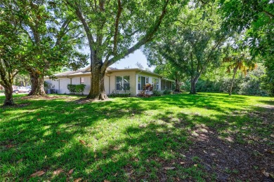 Beautiful home situated on a large and scenic lot with luscious on Highland Lakes Executive Golf Course in Florida - for sale on GolfHomes.com, golf home, golf lot