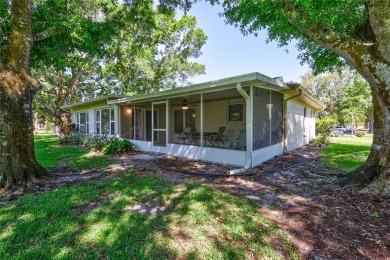 Beautiful home situated on a large and scenic lot with luscious on Highland Lakes Executive Golf Course in Florida - for sale on GolfHomes.com, golf home, golf lot