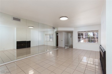 Charming residence nestled in the vibrant heart of Las Vegas on Las Vegas Country Club in Nevada - for sale on GolfHomes.com, golf home, golf lot
