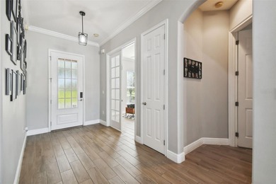 Step into a home that perfectly blends modern upgrades with on Harmony Golf Preserve in Florida - for sale on GolfHomes.com, golf home, golf lot