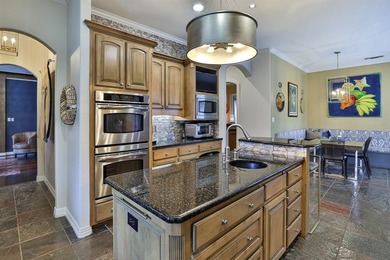 Exceptional custom stone and brick home on nearly one acre in on Mira Vista Country Club in Texas - for sale on GolfHomes.com, golf home, golf lot