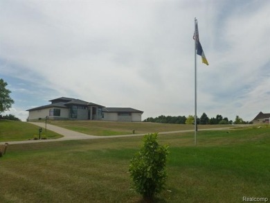 Two of the last lots remaining in the Arnold Palmer designed on Coyote Preserve Golf Club in Michigan - for sale on GolfHomes.com, golf home, golf lot