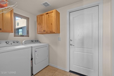 Located in a desirable gated community in Vail, this beautifully on Del Lago Golf Club in Arizona - for sale on GolfHomes.com, golf home, golf lot