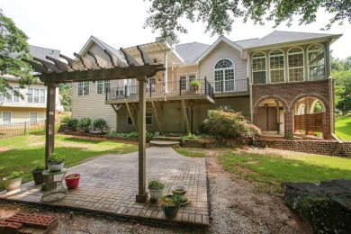 Stunning and spacious home sitting right on the Golf Course in on Mirror Lake Golf Club in Georgia - for sale on GolfHomes.com, golf home, golf lot