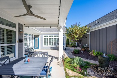 Introducing 16215 Lakeside Loop Lane - a meticulously maintained on The Peninsula Club in North Carolina - for sale on GolfHomes.com, golf home, golf lot