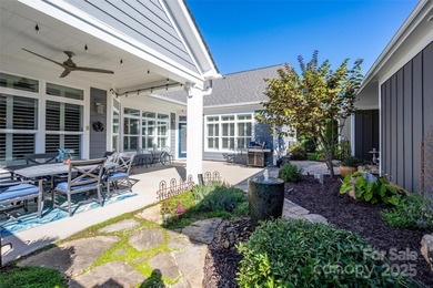 Introducing 16215 Lakeside Loop Lane - a meticulously maintained on The Peninsula Club in North Carolina - for sale on GolfHomes.com, golf home, golf lot
