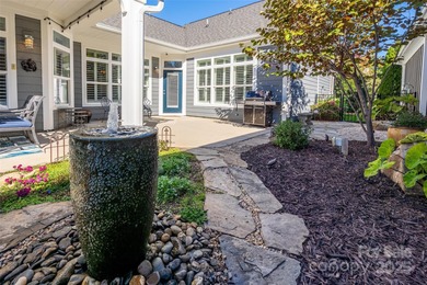 Introducing 16215 Lakeside Loop Lane - a meticulously maintained on The Peninsula Club in North Carolina - for sale on GolfHomes.com, golf home, golf lot