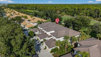 Beautifully updated first-floor coach home featuring luxury on Pelican Sound Golf and River Club in Florida - for sale on GolfHomes.com, golf home, golf lot