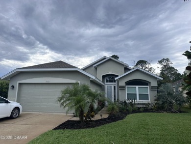 Nestled on a quiet, no-through street in Plantation Bay's on Plantation Bay Golf and Country Club in Florida - for sale on GolfHomes.com, golf home, golf lot