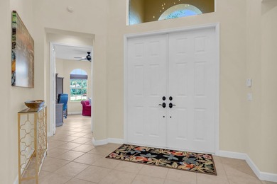 Tee up your Florida lifestyle at 8821 Champions Way in the on PGA Golf Club in PGA Village in Florida - for sale on GolfHomes.com, golf home, golf lot