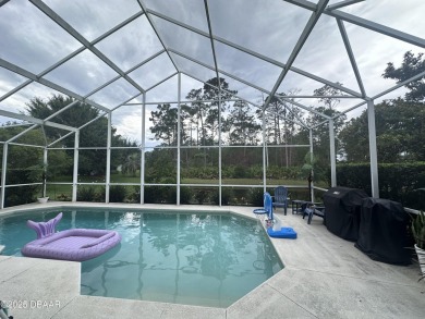 Nestled on a quiet, no-through street in Plantation Bay's on Plantation Bay Golf and Country Club in Florida - for sale on GolfHomes.com, golf home, golf lot