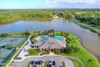 Nestled on a quiet, no-through street in Plantation Bay's on Plantation Bay Golf and Country Club in Florida - for sale on GolfHomes.com, golf home, golf lot
