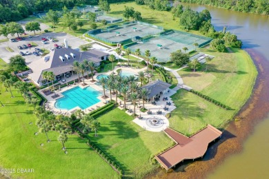 Nestled on a quiet, no-through street in Plantation Bay's on Plantation Bay Golf and Country Club in Florida - for sale on GolfHomes.com, golf home, golf lot