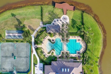 Nestled on a quiet, no-through street in Plantation Bay's on Plantation Bay Golf and Country Club in Florida - for sale on GolfHomes.com, golf home, golf lot