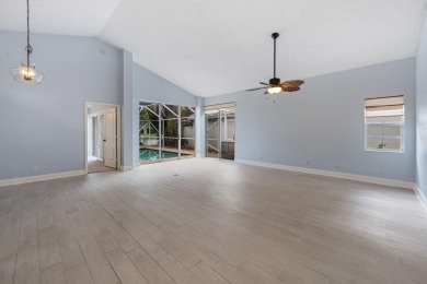 Welcome home to this 3 bedroom, 2 bathroom waterfront home in on Breakers Rees Jones Course in Florida - for sale on GolfHomes.com, golf home, golf lot