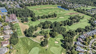 Perched gracefully above the landscape, this Oakhurst residence on Oakhurst Golf and Country Club in Michigan - for sale on GolfHomes.com, golf home, golf lot