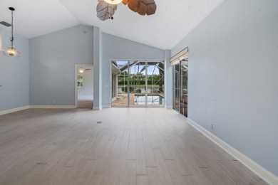 Welcome home to this 3 bedroom, 2 bathroom waterfront home in on Breakers Rees Jones Course in Florida - for sale on GolfHomes.com, golf home, golf lot
