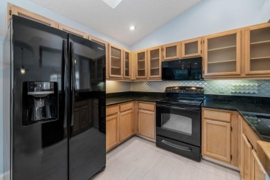 Welcome home to this 3 bedroom, 2 bathroom waterfront home in on Breakers Rees Jones Course in Florida - for sale on GolfHomes.com, golf home, golf lot