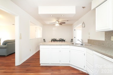 Handsome Raintree one level home that is almost full brick on Raintree Country Club in North Carolina - for sale on GolfHomes.com, golf home, golf lot