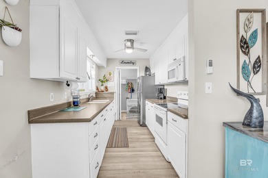 Welcome to your Orange Beach getaway where coastal charm meets on Orange Beach Golf Center in Alabama - for sale on GolfHomes.com, golf home, golf lot