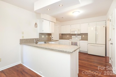 Handsome Raintree one level home that is almost full brick on Raintree Country Club in North Carolina - for sale on GolfHomes.com, golf home, golf lot