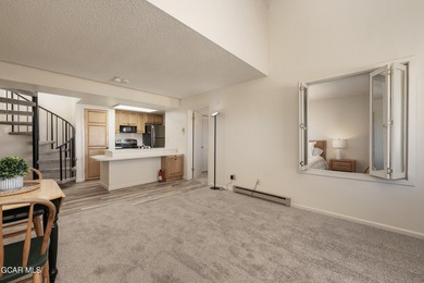 Welcome to this beautifully renovated top-floor, 3-bedroom condo on Headwaters Golf Course At Granby Ranch in Colorado - for sale on GolfHomes.com, golf home, golf lot