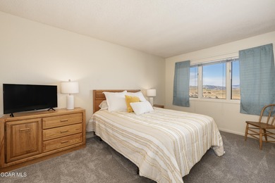 Welcome to this beautifully renovated top-floor, 3-bedroom condo on Headwaters Golf Course At Granby Ranch in Colorado - for sale on GolfHomes.com, golf home, golf lot