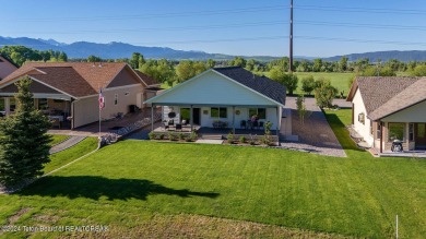 Stunning mountain modern home located on the golf course in on Star Valley RV Golf Course in Wyoming - for sale on GolfHomes.com, golf home, golf lot